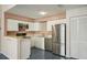 Clean and efficient kitchen with stainless steel appliances at 701 Mirror Lake N Dr # 212, St Petersburg, FL 33701