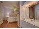 Bathroom with vanity and access to bedroom at 9247 Jakes Path, Largo, FL 33771