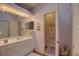 Clean bathroom with double vanity and separate shower at 9247 Jakes Path, Largo, FL 33771