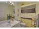 Small bathroom with shower and single sink vanity at 9247 Jakes Path, Largo, FL 33771