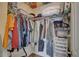 Spacious walk-in closet with ample shelving and hanging space at 9247 Jakes Path, Largo, FL 33771