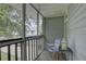 Relaxing screened porch with outdoor seating and view at 9247 Jakes Path, Largo, FL 33771
