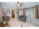 Relaxing sunroom with wicker furniture and ample natural light at 315 Princess St, Clearwater, FL 33755