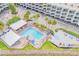 Community pool with plenty of lounge chairs and seating at 2506 N Rocky Point Dr # 274, Tampa, FL 33607