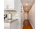 Modern kitchen with white cabinets and granite countertops at 2506 N Rocky Point Dr # 274, Tampa, FL 33607