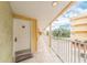 Hallway with white doors and tile flooring at 2506 N Rocky Point Dr # 274, Tampa, FL 33607