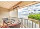 Balcony with water views and seating for two at 2506 N Rocky Point Dr # 274, Tampa, FL 33607