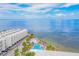Aerial view of waterfront community with pool and parking at 2506 N Rocky Point Dr # 274, Tampa, FL 33607