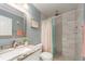 Updated bathroom with granite countertop and walk-in shower at 2506 N Rocky Point Dr # 274, Tampa, FL 33607