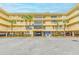 Condo building exterior with parking and welcome center at 2506 N Rocky Point Dr # 274, Tampa, FL 33607