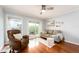 Living room with sliding doors leading to a balcony at 2506 N Rocky Point Dr # 274, Tampa, FL 33607