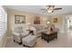 Living room with comfortable seating and hardwood floors at 5080 Locust Ne St # 232, St Petersburg, FL 33703