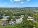 Aerial view of the home and surrounding neighborhood at 3045 Kevlyn Ct, Safety Harbor, FL 34695