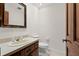 Small bathroom with toilet and sink vanity at 3045 Kevlyn Ct, Safety Harbor, FL 34695