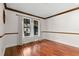 Formal dining room with hardwood floors and crown molding at 3045 Kevlyn Ct, Safety Harbor, FL 34695