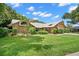 Beautiful single-story house with lush landscaping at 3045 Kevlyn Ct, Safety Harbor, FL 34695