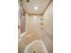 Large walk-in shower with built-in seat and grab bar at 3045 Kevlyn Ct, Safety Harbor, FL 34695