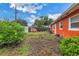 Backyard with chickens, coop, and mature landscaping at 6195 28Th N Ave, St Petersburg, FL 33710