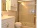 Bathroom with shower, toilet and vanity at 3455 Countryside Blvd # 15, Clearwater, FL 33761