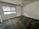 Simple bedroom with carpet flooring and window with blinds at 182 114Th Ne Ter # 182, St Petersburg, FL 33716