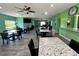 Community room with tables, chairs, and a sitting area at 182 114Th Ne Ter # 182, St Petersburg, FL 33716