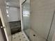 Clean bathroom with shower and tiled flooring at 182 114Th Ne Ter # 182, St Petersburg, FL 33716