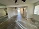 Living room with large mirror and access to patio at 182 114Th Ne Ter # 182, St Petersburg, FL 33716
