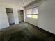 Bedroom with carpet, double closets, and window with blinds at 182 114Th Ne Ter # 182, St Petersburg, FL 33716