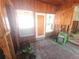 An entryway undergoing renovations, with exposed walls and flooring at 3108 58Th S St, Gulfport, FL 33707
