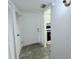 Hallway featuring closet and kitchen at 400 N Bayshore Blvd # 104, Clearwater, FL 33759