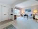 Inviting living room features plush carpeting, neutral walls, and ample natural light at 7839 39Th N Ter, St Petersburg, FL 33709