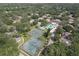 Aerial view showing tennis courts and community layout at 11837 Wildeflower Pl, Temple Terrace, FL 33617