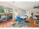 Bright dining area with patio access and seating for four at 11837 Wildeflower Pl, Temple Terrace, FL 33617
