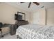 Bedroom with a ceiling fan and plenty of closet space at 11837 Wildeflower Pl, Temple Terrace, FL 33617