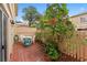 Private patio with brick pavers and small table at 11837 Wildeflower Pl, Temple Terrace, FL 33617