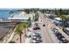 Aerial view of Gulfport waterfront, featuring a street with parked cars and palm trees at 3108 58Th S St, Gulfport, FL 33707