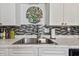 Kitchen sink with modern faucet and stylish backsplash at 3108 58Th S St, Gulfport, FL 33707