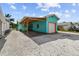 Teal house with carport and gravel driveway at 3108 58Th S St, Gulfport, FL 33707