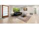 Living room with a modern aesthetic and comfortable seating area at 2517 Trinidad St, Sarasota, FL 34231