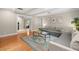 Open living area with hardwood floors and views to kitchen at 2517 Trinidad St, Sarasota, FL 34231