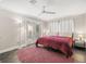 Main bedroom with king-size bed and private access to backyard at 2517 Trinidad St, Sarasota, FL 34231