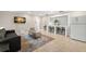 Bright living room featuring a stylish rug and comfortable seating at 2517 Trinidad St, Sarasota, FL 34231