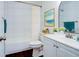 Clean bathroom with white subway tiles and updated vanity at 635 Fairmont Ave # D, Safety Harbor, FL 34695