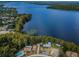 Aerial view of lakefront homes and community at 865 Maclaren N Dr # D, Palm Harbor, FL 34684
