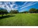 Expansive view of a golf course with green fairways and trees at 865 Maclaren N Dr # D, Palm Harbor, FL 34684