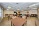 Community game room with card tables and seating at 865 Maclaren N Dr # D, Palm Harbor, FL 34684