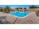 Resort-style community pool with spacious deck at 865 Maclaren N Dr # D, Palm Harbor, FL 34684