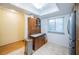 Kitchen boasts wood cabinets, granite counters, and stainless steel appliances at 865 Maclaren N Dr # D, Palm Harbor, FL 34684