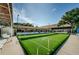 Enjoy a game of shuffleboard under the covered area at 865 Maclaren N Dr # D, Palm Harbor, FL 34684