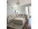 Bright living room with a sectional sofa and access to the back yard at 1301 22Nd N Ave, St Petersburg, FL 33704